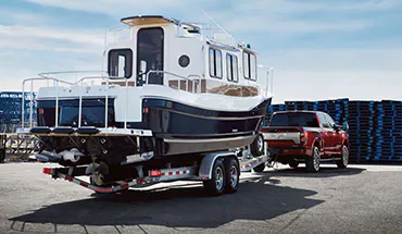 2022 Nissan TITAN Truck towing boat | Nissan of St. Augustine in St. Augustine FL
